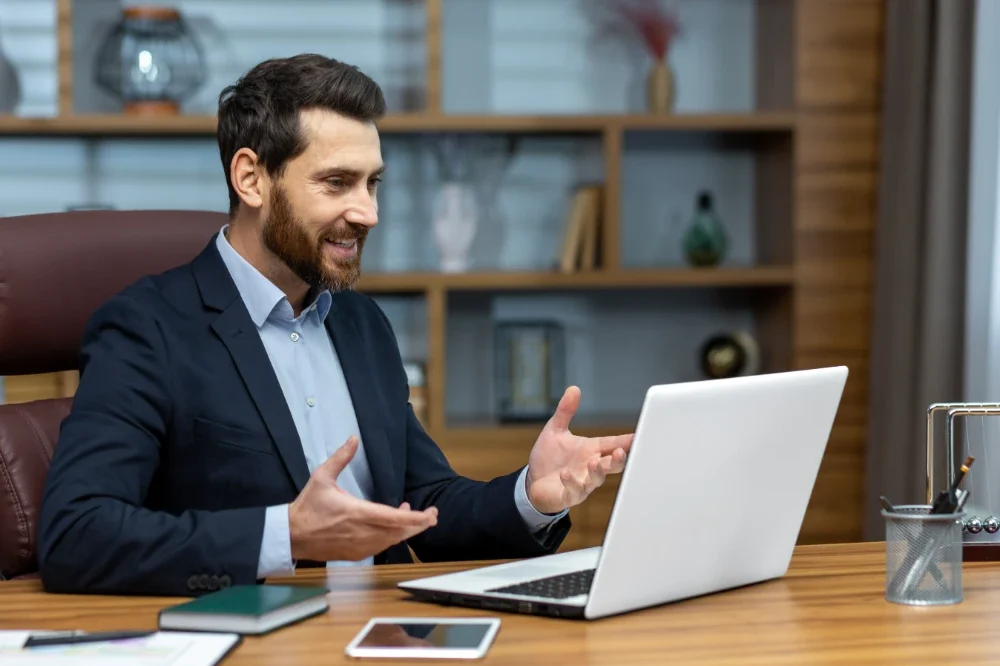 happy business coach with web design